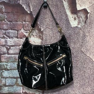 Dooney & Bourke Patent Black Shoulder Bag with Gold Details.   Cinzia